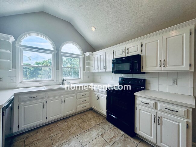 Building Photo - Brand New Paint, Wood Floors, Walkout Fini...