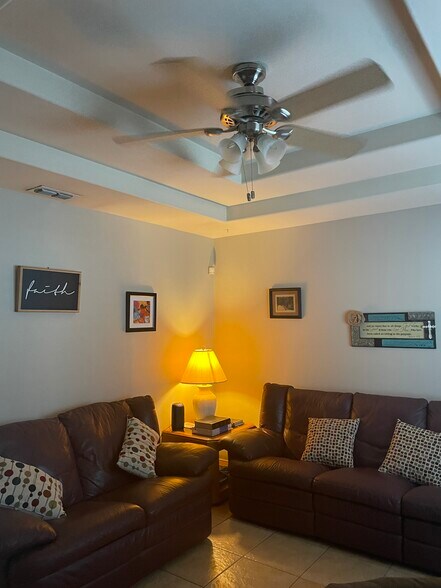 Living Room with ceiling fan - 2607 Ringold Cir
