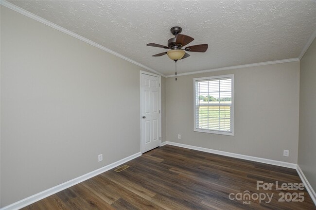 Building Photo - 711 W C J Thomas Rd