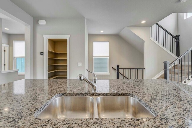Building Photo - Modern 4BR with Open Kitchen, Patio & 2-Car Garage
