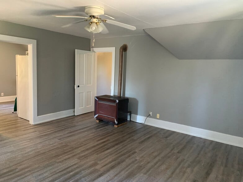 Living room with heater - 1201 Steele St