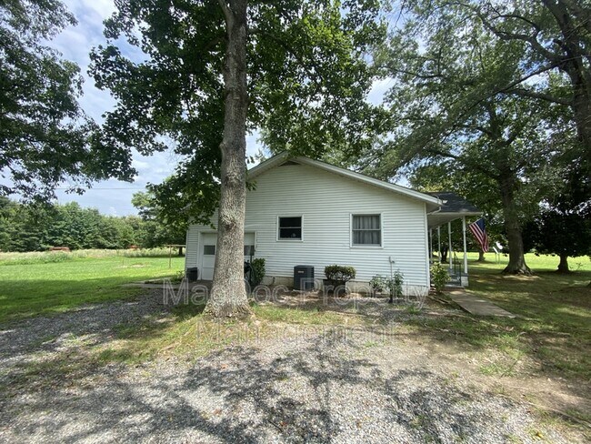Building Photo - 10291 Paige Rd