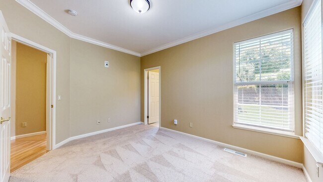 Building Photo - Gorgeous Home with private yards, large de...