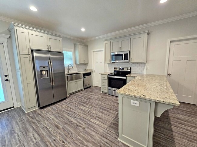 Building Photo - Stylish 4-Bedroom Home with Screened Porch...