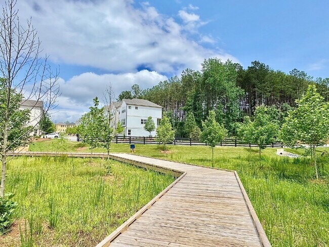 Building Photo - Your Alpharetta Retreat Awaits – Elegant T...