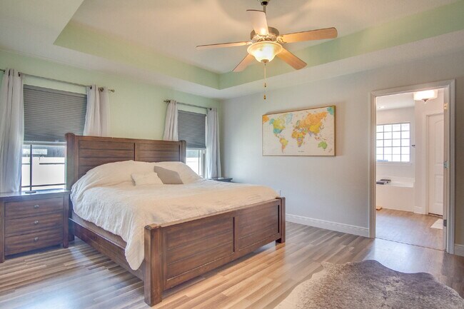 Building Photo - Milton 4BR Pool Home with Office, Vaulted Ceilings, Screened Saltwater Pool & 2-Car Garage