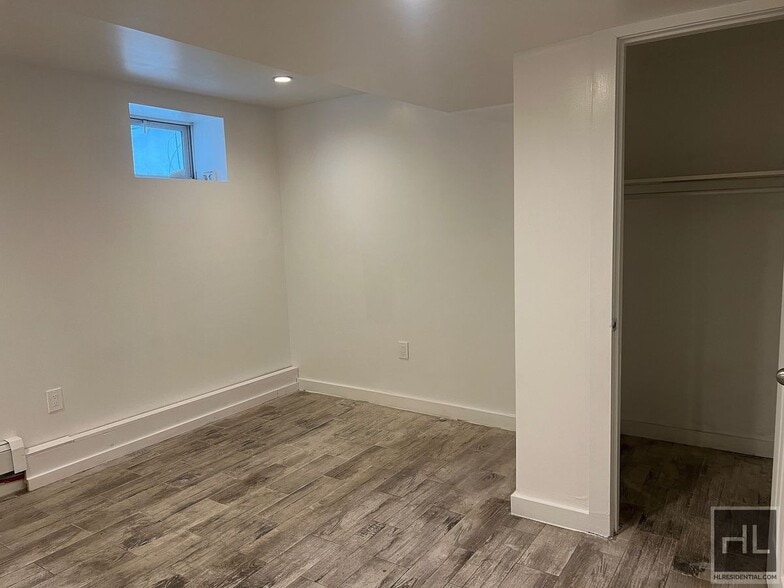 Building Photo - 2BR 1BA Lower Level All Utilities Included w/ Laundry Beside Highland Park