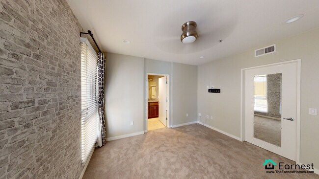 Building Photo - 2 + 2 Modern Condo in Prime Warner Center ...