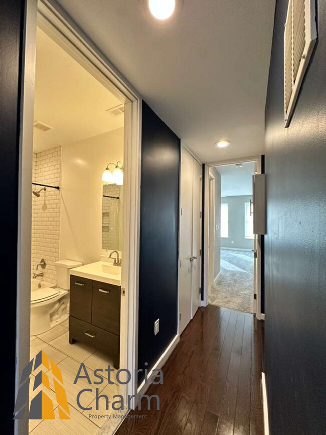 Building Photo - Beautifully Renovated 3BR Rowhome Near Johns Hopkins – Gated Parking + Modern Upgrades