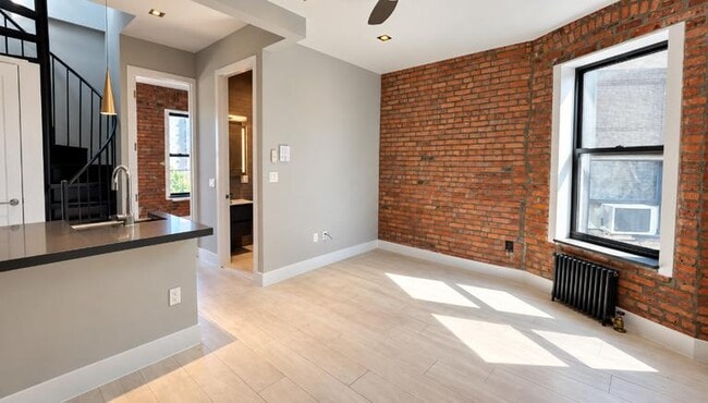 Building Photo - 111 E 119th St