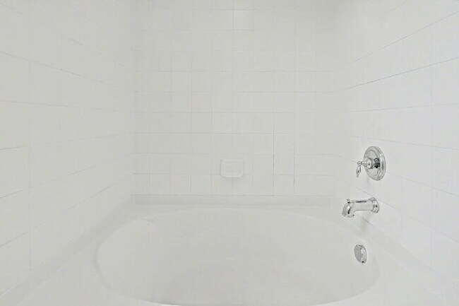 Building Photo - Beautifully Updated 3-Bedroom End-Unit Townhome Facing Open Space with Attached 2-Car Garage in G...
