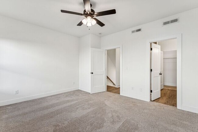 Building Photo - High-End 2BR Townhome | Rooftop Terrace + 2-Car Garage | 24-Unit Community