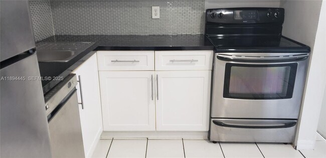 Building Photo - 8301 SW 142nd Ave