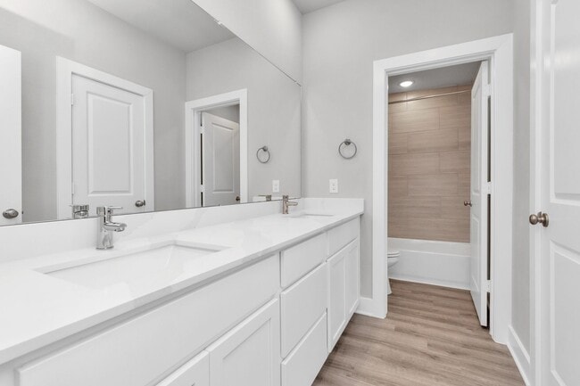 Building Photo - Welcome to the Redbud — A Fresh Take on Modern Living.