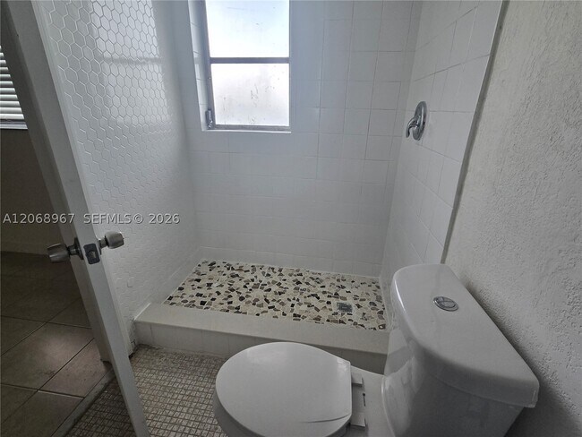 Building Photo - 8740 N Sherman Cir