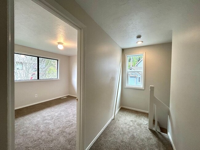 Building Photo - Beautiful 4BD Home | Fireplace, Fenced Backyard, Deck, Garage & A/C