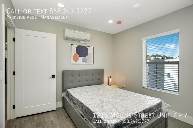 Building Photo - $1,000 Move-in Credit! The Carl on Lauretta