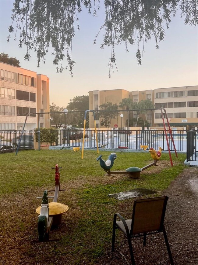 Building Photo - 6841 SW 147th Ave