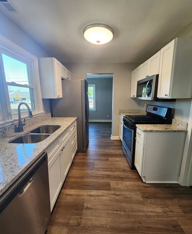 Building Photo - One-of-a-Kind 3 Bedroom Home with Renovated Kitchen & Spacious Yard