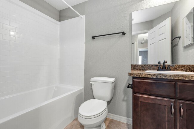 Building Photo - Freshly Painted 3BR Home with Spacious Yard, Modern Baths & No Deposit Option!