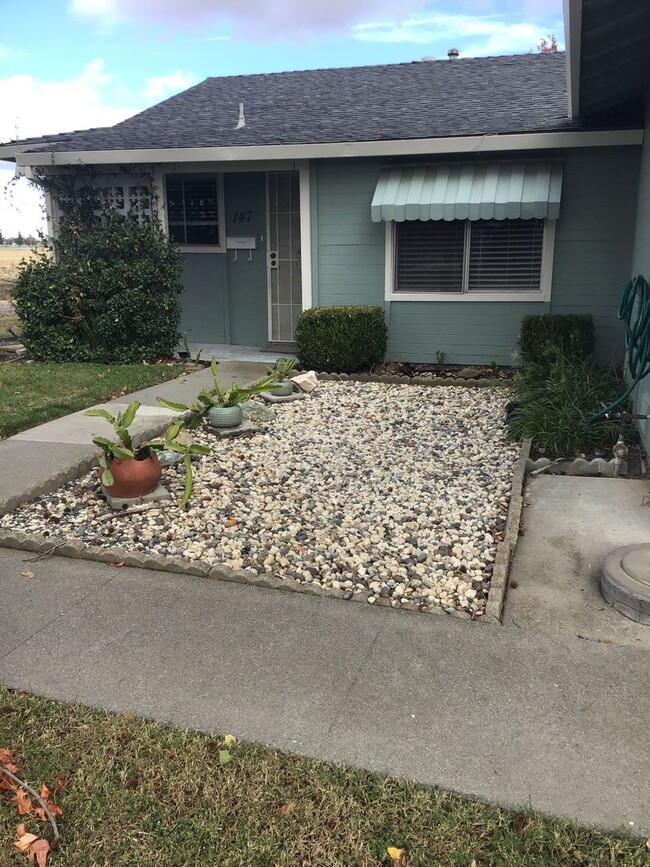 Building Photo - COMING SOON!! 2 Bedroom 2 bath in 55+ Comm...