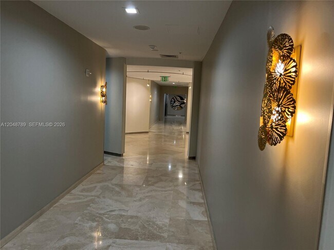 Building Photo - 10275 Collins Ave