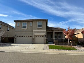 Building Photo - Desirable and Spacious 5-Bedroom Home in Empire Ranch!