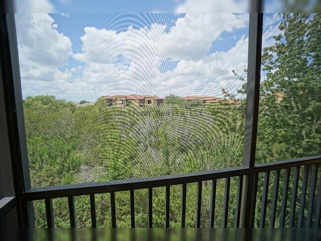 Building Photo - Beach Walk Condo | 2BR/2BA with Bay Views