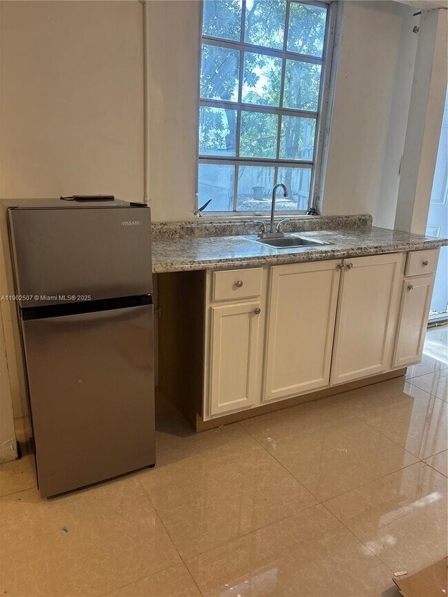 Building Photo - 8900 NW 25th Ave