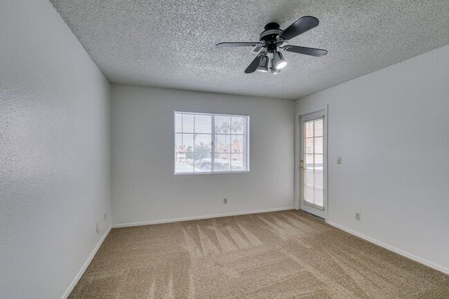 Building Photo - Charming Second-Floor Condo with Two Bedrooms and Fireplace