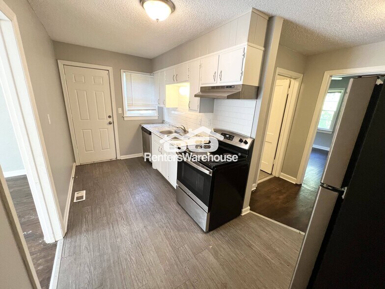 Building Photo - 8510 Woodland Ave