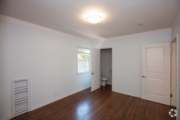 Bedroom number two features a window to the back garden as well as one to the side breezeway. - 826 21st St