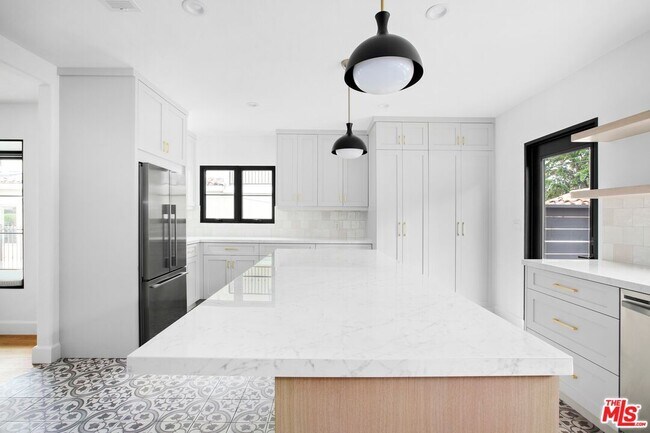 Building Photo - 10525 Cushdon Ave