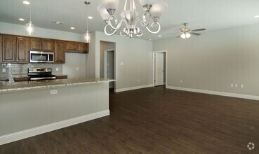 Building Photo - Beautiful 4/2 + Private Fenced Yard + Addi...