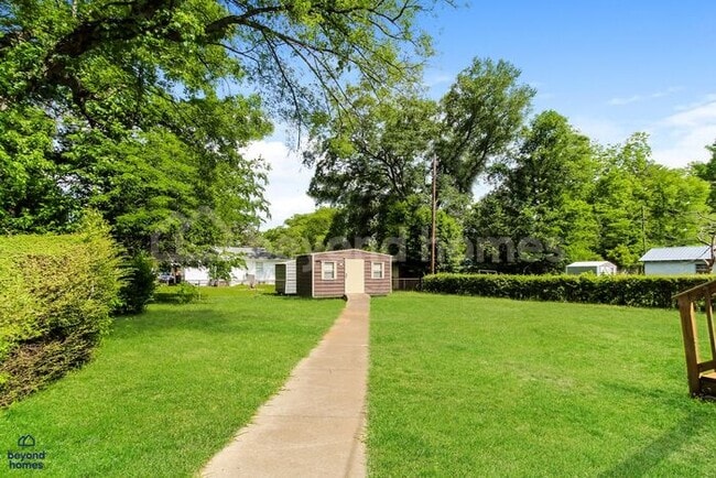 Building Photo - Updated Bungalow with Massive Deck and Fully Fenced Yard!