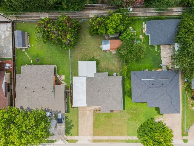 Building Photo - **$40K+ IN UPGRADES AND A FENCED BACKYARD WITH TWO STORAGE BUILDINGS**