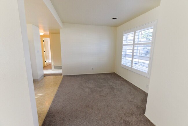 Building Photo - Sunny 2BR/2BA Coastal Retreat — Steps from the Sand with Ocean Breezes