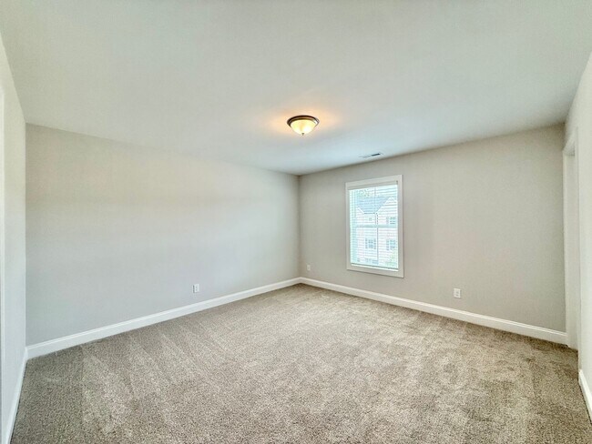 Building Photo - Stunning Newly Built 3BD, 3.5BA Fuquay Varina Townhome Near Shopping and Dining