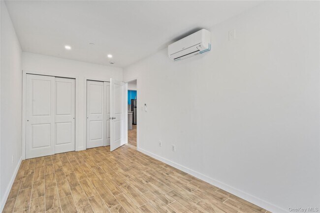 Building Photo - 213-41 38th Ave