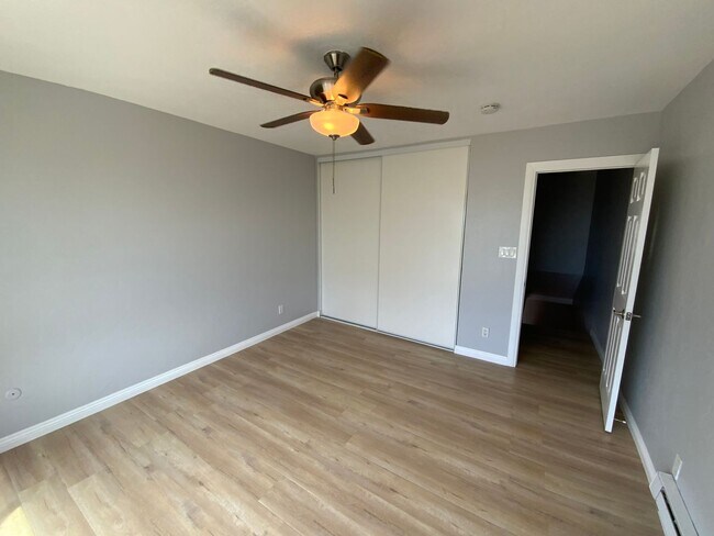 Building Photo - Long-Term Unfurnished Rental – Available N...