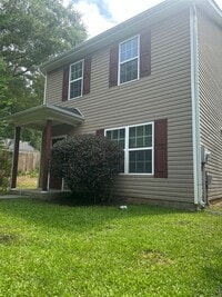 Building Photo - Welcome to this spacious 4-bedroom, 2.5-ba...