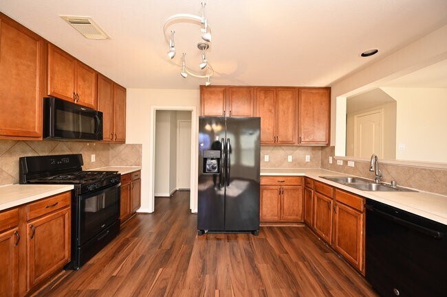 Building Photo - 9403 Coatsworth Dr