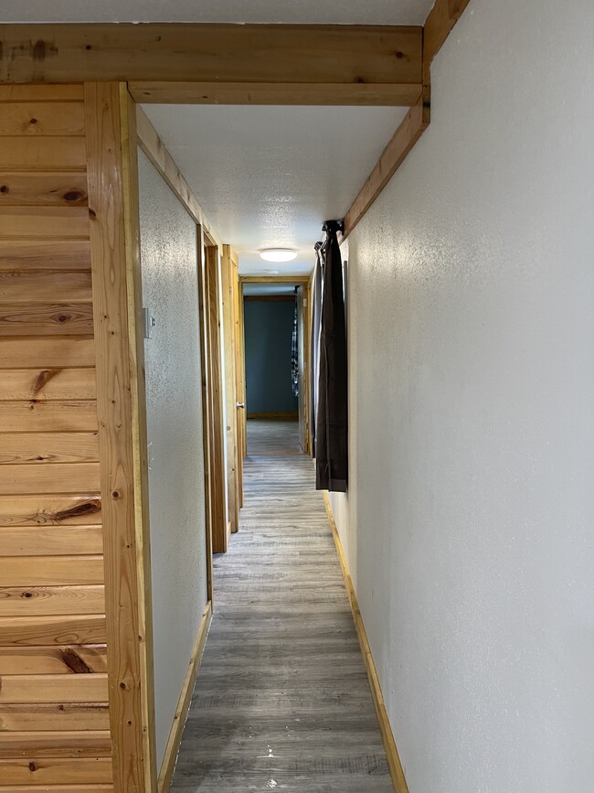 Hallway to bedrooms + bathroom - 4 Meadow Lark Ln