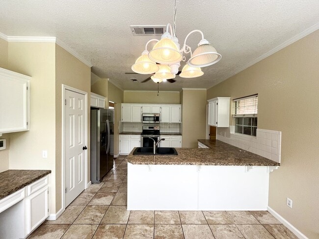 Building Photo - Available NOW!!!! This beautiful 2 story, 4 bedroom, 2 bath, two car garage with garage door open...