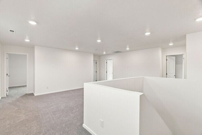 Building Photo - Spacious 5-Bedroom with Loft with 3-Car Garage