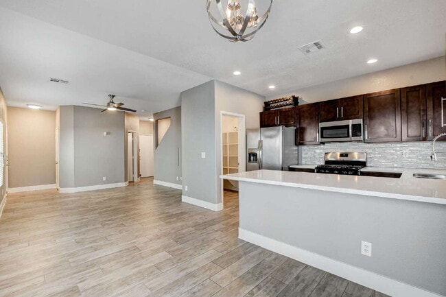 Building Photo - "Charming 2-Bedroom Townhouse Retreat with 2.5 Baths in South Henderson -with Backyard “