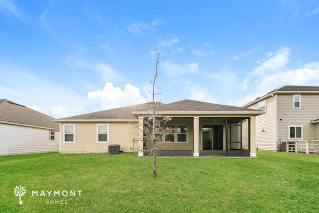 Building Photo - Home with Pond Views & Screened-In Patio