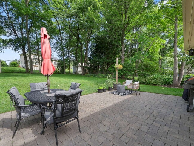 Building Photo - Beautifully Updated Home with Finished Lower Level, Fenced Yard & Exceptional Outdoor Living