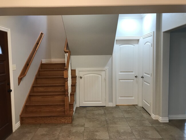 under the stairs closet, half bath, coat closet - 606 South A Ave.