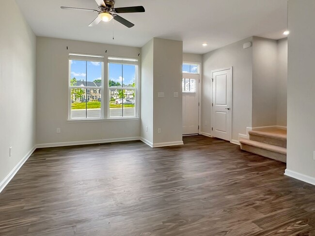 Building Photo - Move-In Ready Townhome with Finished Basem...